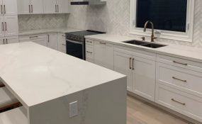 Herringbone Marble Tile Backsplash in Kitchen